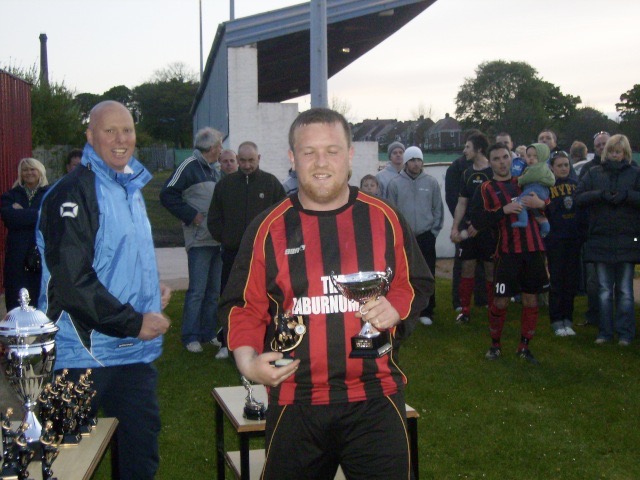 PAUL CARTER RECIEVING THE DAIRY LANE DENTAL PRACTICE RUNNERS UP TROPHY