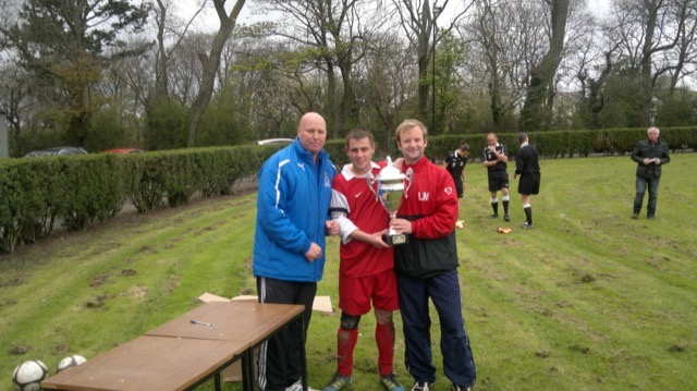 Lee Marsh and John Clegg of the Inn Place FC recieving Solex Manufacturing Cup