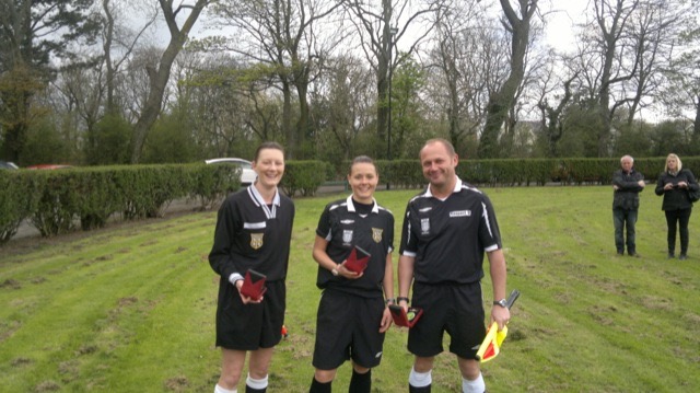 Rebecca Welsh middle and her assistants Joanne Howe and Gary Hills who officiated the Solex Manufacturing Cup Final